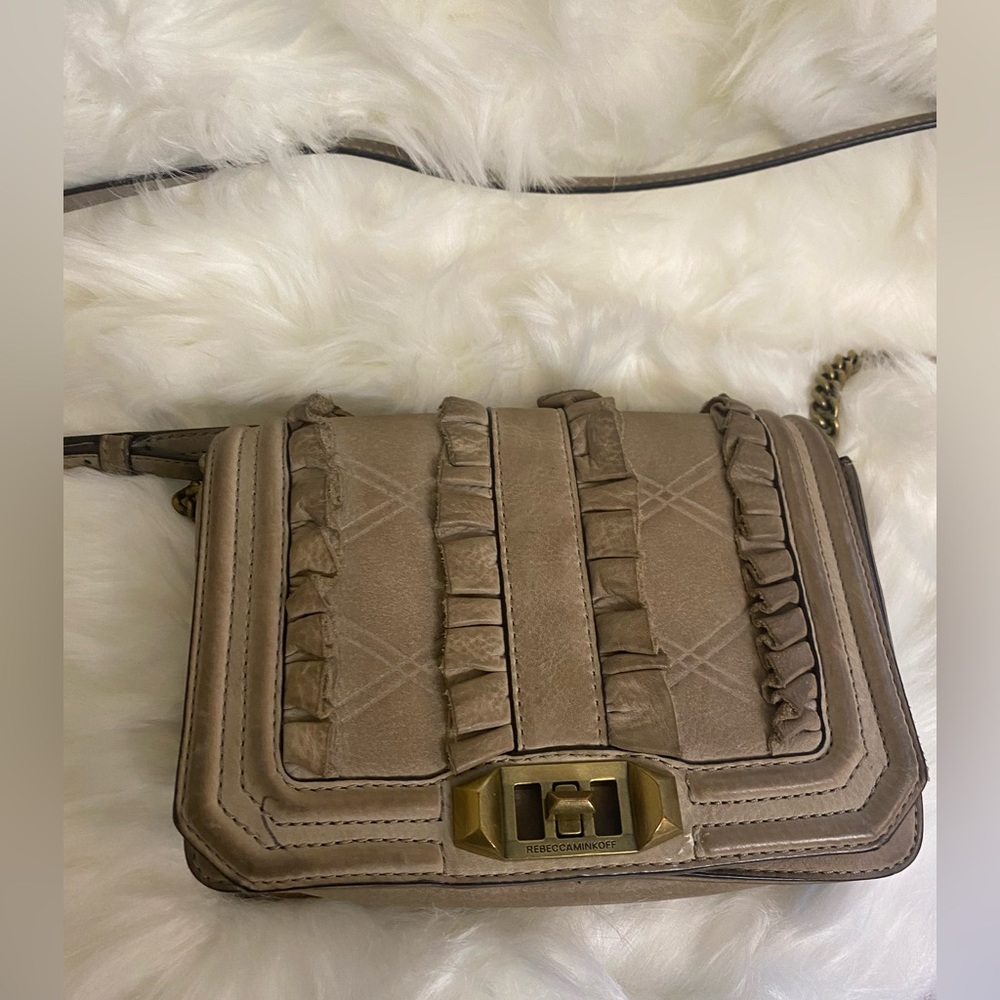 Rebecca Minkoff crossbody bag. Super cute fairly worn, everyday bag. Leather Tan